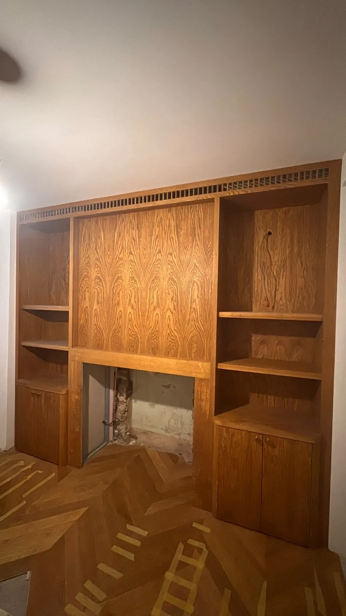 A Walk in the Park, The fireplace unit in place, before the fire and travertine surround went in